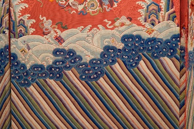 A Chinese folding screen with silk embroidery of phoenixes on a red ground, Qianlong
