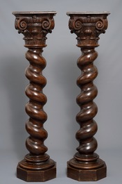 A pair of carved oak twisted pillars with Corinthian capitals, 18th C.
