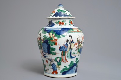 A Chinese wucai baluster vase and cover with playing boys, Transitional period