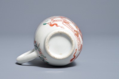 A Dutch-decorated Chinese cup with the royal Dutch arms of Oranje-Nassau, dated 1747, Qianlong