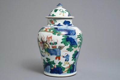 A Chinese wucai baluster vase and cover with playing boys, Transitional period