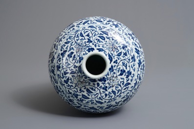 A Chinese blue, white and underglaze red 'lotus scroll' meiping vase, 19/20th C.