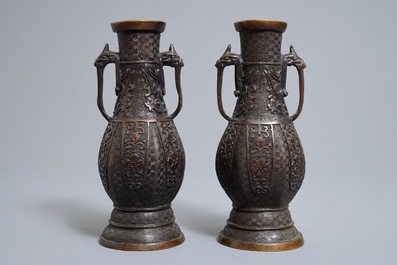 A pair of Chinese bronze vases in archaic style, 19th C.