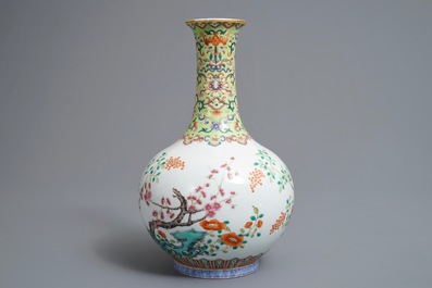 A Chinese famille rose bottle vase with floral design, Jiaqing mark, 19/20th C.