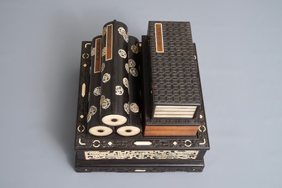 A Chinese bone and mother of pearl inlaid wood box with multiple compartments, 19th C.