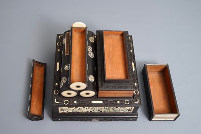 A Chinese bone and mother of pearl inlaid wood box with multiple compartments, 19th C.