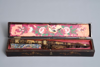 Two Chinese lacquer and painted paper fans with original boxes, Canton, 19th C.