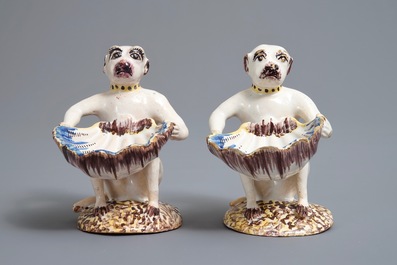 A pair of polychrome Brussels faience monkey-shaped salts, 18th C.