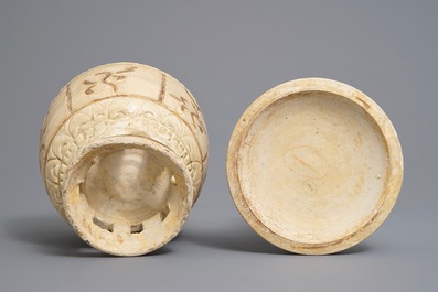 A Vietnamese bowl and cover on reticulated stand, Tr&acirc;n Dynasty (13th-15th C.)