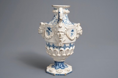 A Spanish blue and white two-handled vase with applied design and dedication, dated 1801