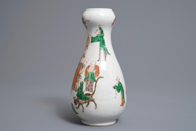A Chinese famille verte pear-shaped bottle vase with Luohans, 19th C.