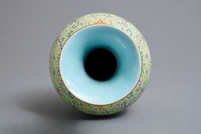 A Chinese famille rose lime-green ground bottle vase, Jiaqing mark and of the period