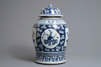 A large Chinese blue and white vase and cover with 'antiquities' design, 19th C.