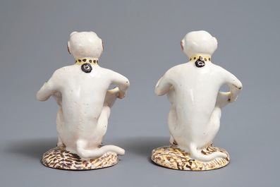 A pair of polychrome Brussels faience monkey-shaped salts, 18th C.