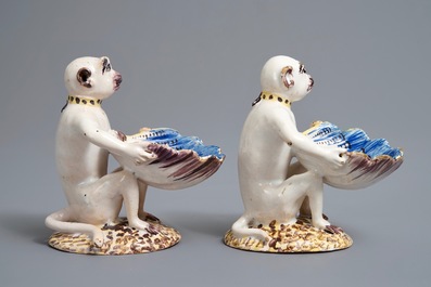 A pair of polychrome Brussels faience monkey-shaped salts, 18th C.