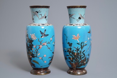 A pair of Japanese cloisonn&eacute; vases with birds and flowers, Meiji, 19th C.
