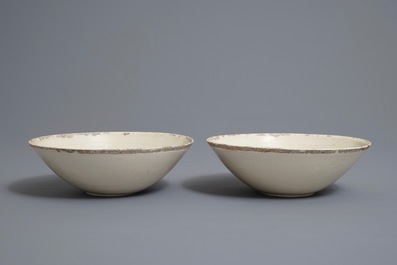 A pair of Chinese qingbai moulded 'phoenix' bowls, Song