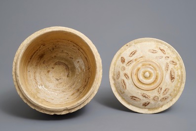 A Vietnamese bowl and cover on reticulated stand, Tr&acirc;n Dynasty (13th-15th C.)