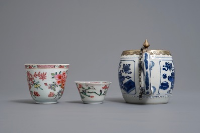 Two Chinese famille rose cups and saucers and a blue and white teapot, Kangxi/Qianlong