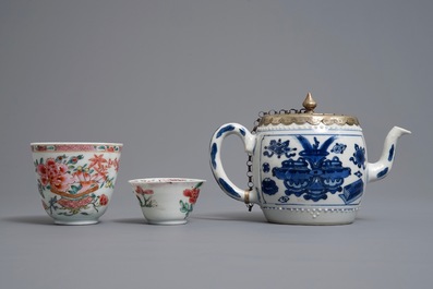 Two Chinese famille rose cups and saucers and a blue and white teapot, Kangxi/Qianlong