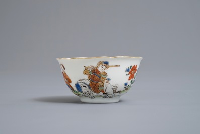 A Chinese famille rose cup and saucer with a warrior riding an elephant, Yongzheng