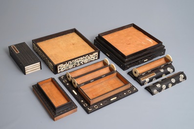 A Chinese bone and mother of pearl inlaid wood box with multiple compartments, 19th C.