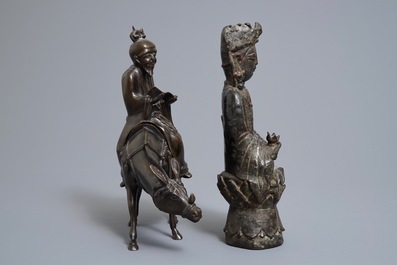 A Chinese bronze Guanyin and a group with a scholar riding a donkey, Ming and later