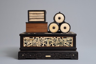 A Chinese bone and mother of pearl inlaid wood box with multiple compartments, 19th C.