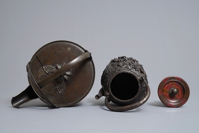 Two Japanese cast iron and bronze tetsubin kettles, Meiji, 19th C.