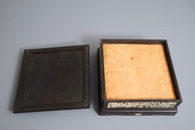 A Chinese bone and mother of pearl inlaid wood box with multiple compartments, 19th C.