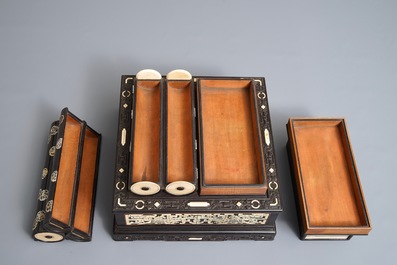 A Chinese bone and mother of pearl inlaid wood box with multiple compartments, 19th C.