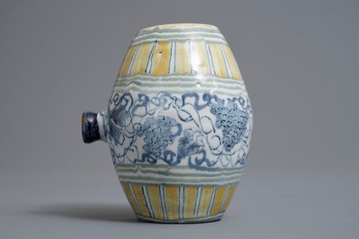 A polychrome Dutch Delft barrel-shaped gin flask with grape vines, 18th C.