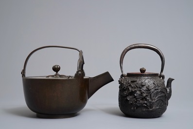 Two Japanese cast iron and bronze tetsubin kettles, Meiji, 19th C.