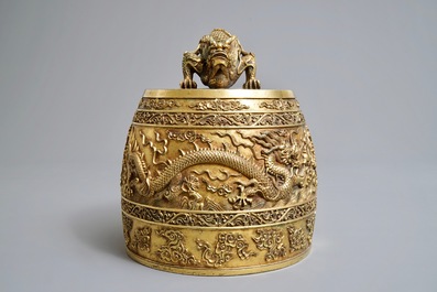 A Chinese gilt bronze bell in zitan suspension frame, Qianlong mark, 18/19th C.