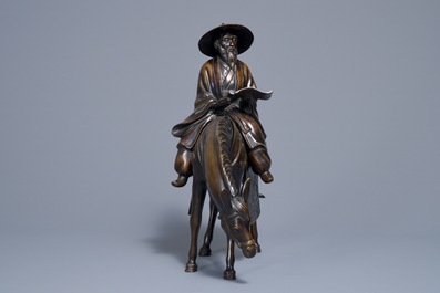 A large Japanese bronze group of a sage on horseback, Meiji, 19th C.