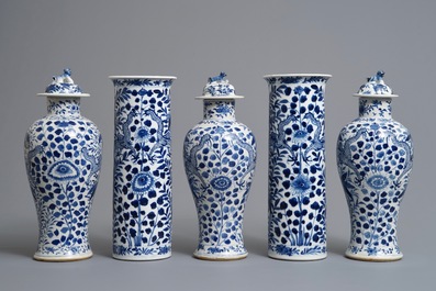 A Chinese blue and white five-piece garniture with dragons, Kangxi marks, 19th C.