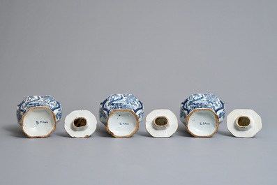 A Dutch Delft blue and white five-piece garniture with birds of paradise, 18th C.