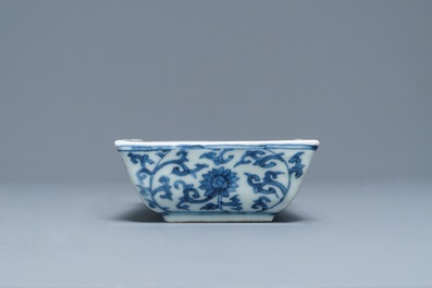 A rectangular Chinese blue and white dish with a phoenix among lotus scrolls, Wanli mark, 19/20th C.