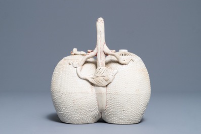 A Chinese biscuit 'conjoined peach' teapot and cover, Kangxi/Yongzheng