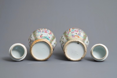 Two pairs of Chinese Canton famille rose vases and covers, 19th C.