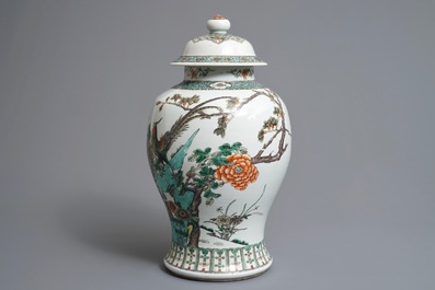 A Chinese famille verte vase and cover with pheasants and flowers, 19th C.