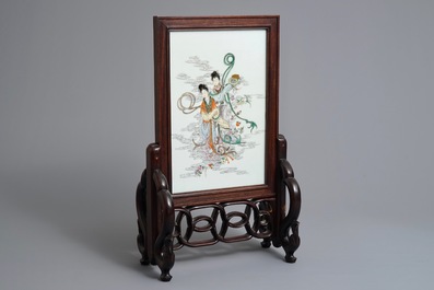A Chinese carved wood table screen with famille rose plaque of the immortal Magu, 19/20th C.