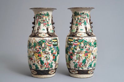 A pair of Chinese Nanking famille rose vases and a bowl, 19th C.
