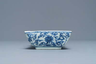 A rectangular Chinese blue and white dish with a phoenix among lotus scrolls, Wanli mark, 19/20th C.