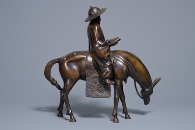 A large Japanese bronze group of a sage on horseback, Meiji, 19th C.