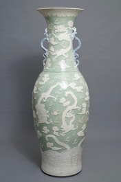 A massive Chinese relief-decorated celadon 'dragon' vase, 19th C.