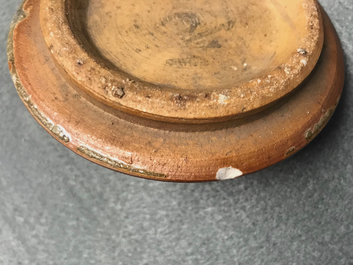 A pair of Chinese monochrome oxblood-glazed jars and covers, 19th C.