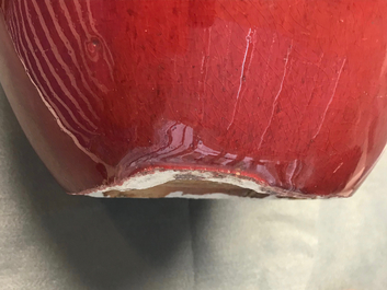 A pair of Chinese monochrome oxblood-glazed jars and covers, 19th C.