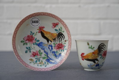A Chinese famille rose cup and saucer with roosters, Yongzheng