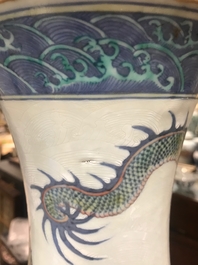A pair of large Chinese doucai 'dragon' bottle vases, tianqiu ping, Qianlong mark, 19th C.